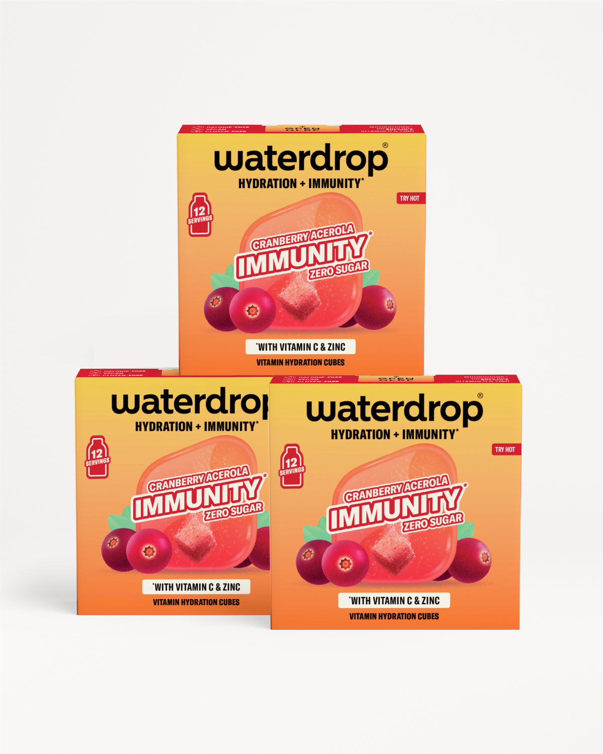Tri krabičky Waterdrop pre hydratáciu a imunitu poskladané do pyramídy na svetlom pozadí.