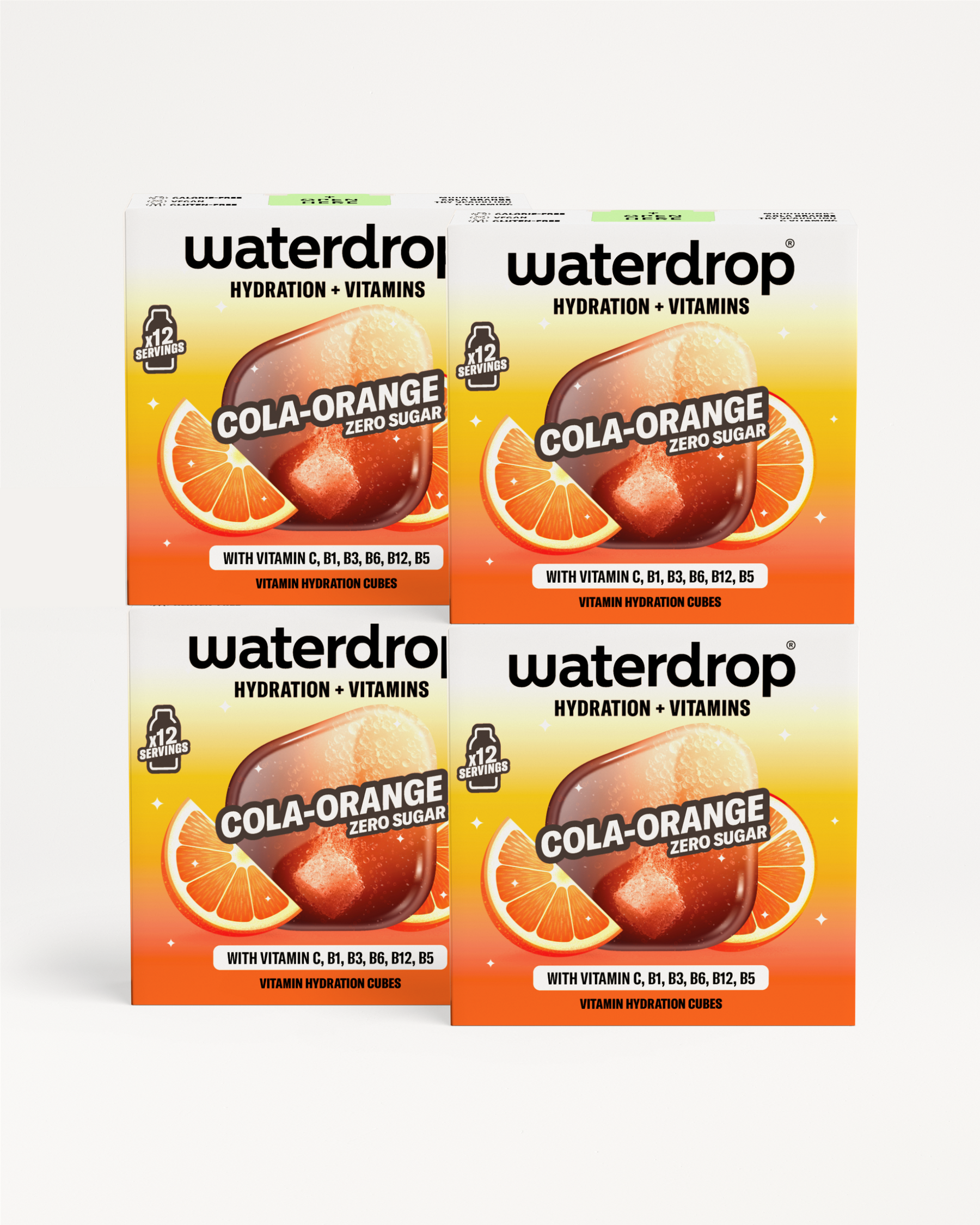 Štyri krabičky Waterdrop Cola Orange s príchuťou koly a pomaranča, umiestnené na bielom pozadí.
